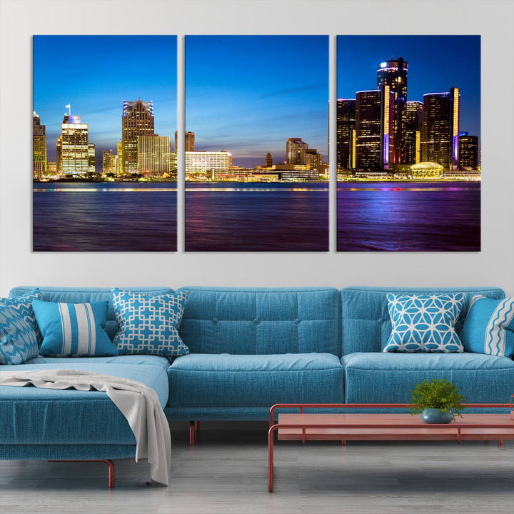 The living room features a breathtaking canvas print titled "Detroit City Lights Night Bright Blue Skyline Cityscape View," presented in a stunning triptych format on museum-quality canvases that are ready to hang.