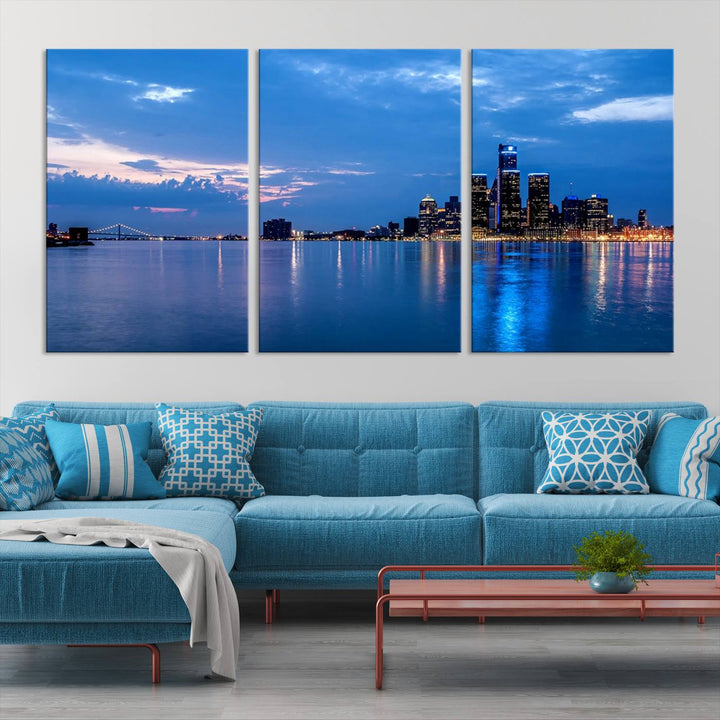 The "Detroit City Lights Night Blue Cloudy Skyline Cityscape View" wall art, displayed on museum-quality canvases, is split into three gallery-wrapped panels.