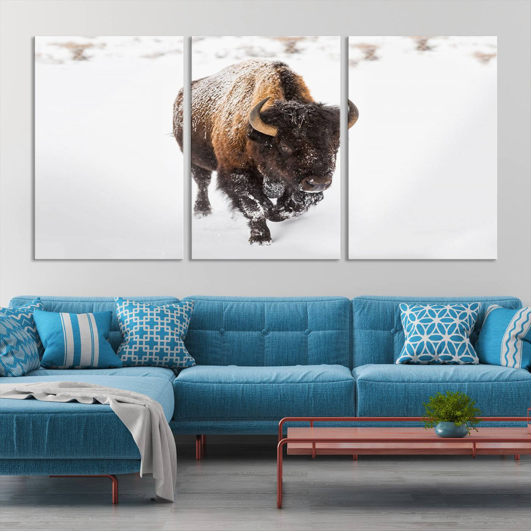 The Bison Winter Wall Art Canvas Print for Farmhouse Decor is displayed as a triptych in the living room. This artwork, printed on museum-quality canvases with a UV-protective coating to maintain its vibrant colors, is the focal point of the space.