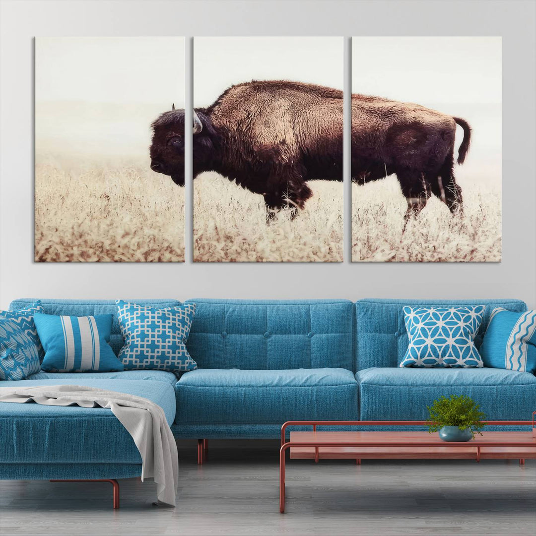 A stylish living room showcases the captivating "Bison in Field" Wall Art Canvas Print as farmhouse decor.