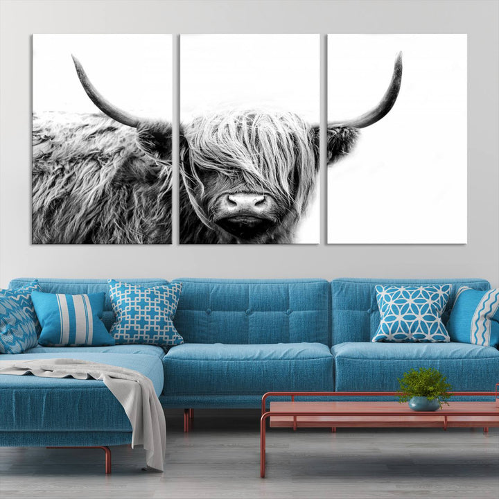 A museum-quality triptych titled "Black White Scottish Highland Cow Cattle Art Print Farmhouse Wall Art Canvas Print" embellishes the dark wall. The canvas is equipped with a UV-protective coating to ensure lasting vibrancy.