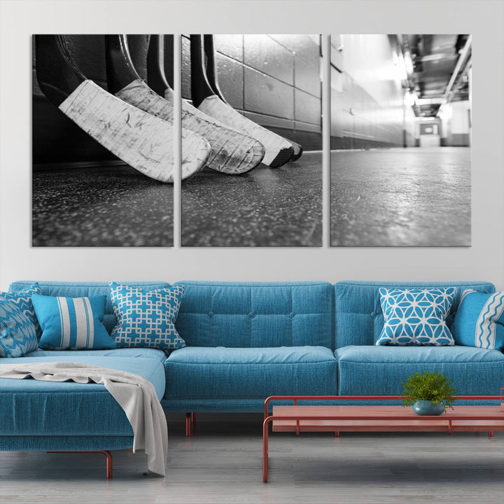 A living room featuring a large Ice Hockey Wall Art Canvas Print on gallery-wrapped canvas.