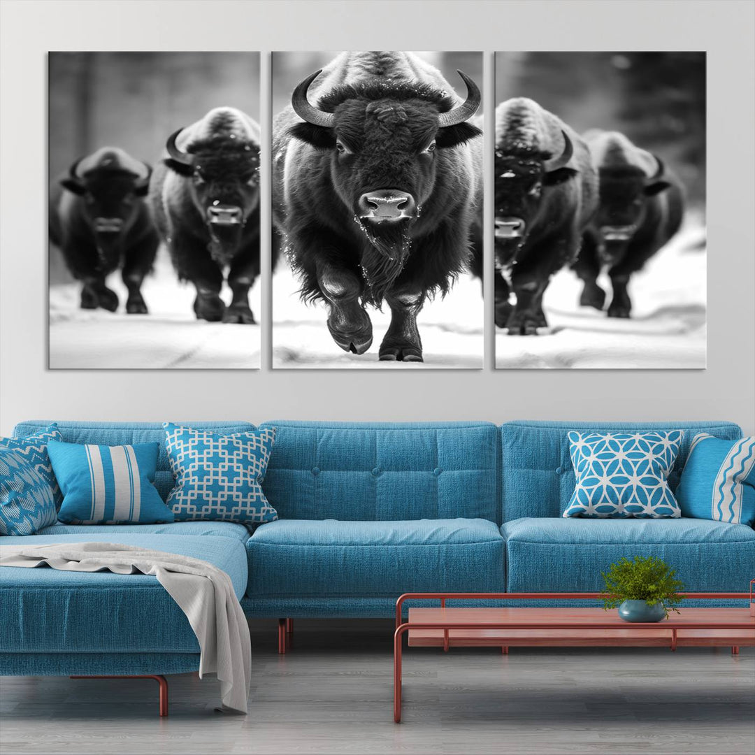 A modern living room features a striking black-and-white American Bison Art | Buffalo Herd Wall Art Canvas Print on the wall.