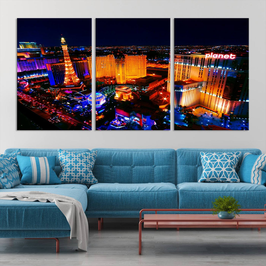 Las Vegas Wall Art Canvas Print showcases a dynamic and luminous cityscape at night with tall buildings and bustling streets. Expertly printed on museum-quality canvas, this gallery-wrapped artwork is enhanced with a UV-protective coating to ensure lasting brilliance.