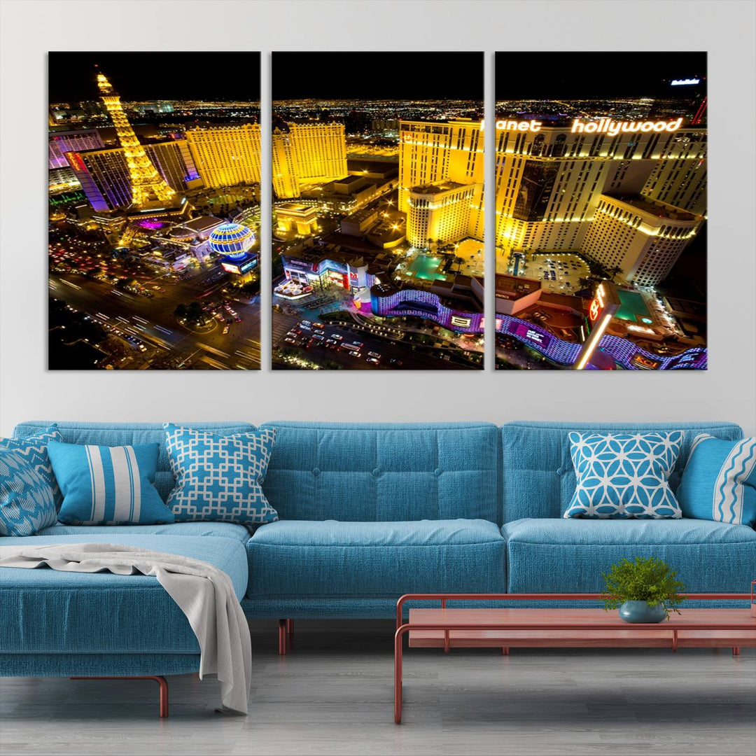 The modern living room features a Las Vegas Wall Art Canvas Print, a museum-quality triptych showcasing a vibrant cityscape with neon lights.