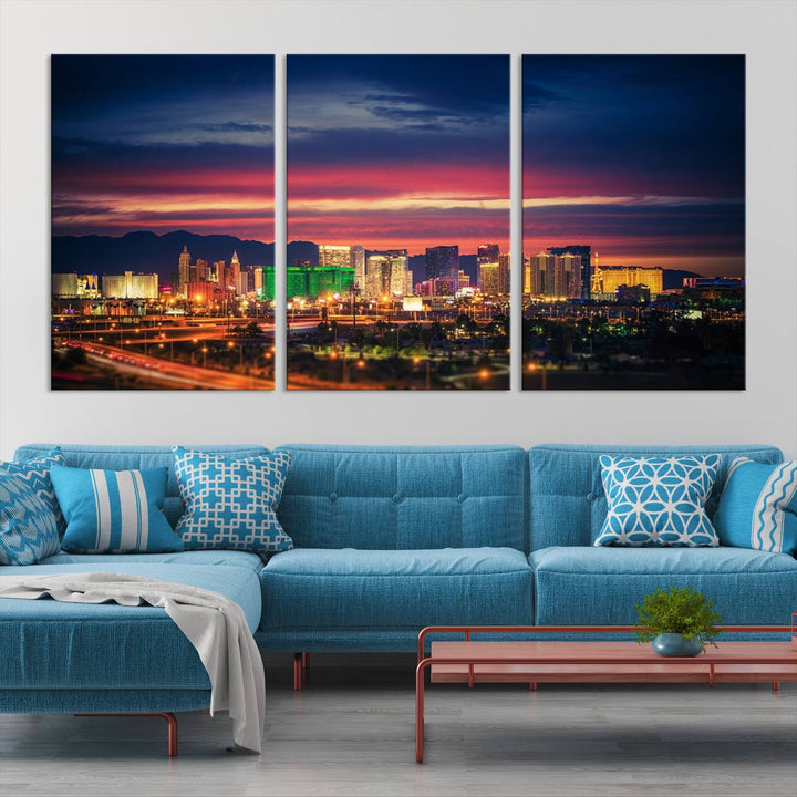 The living room is adorned with the Las Vegas Wall Art Canvas Print, a triptych showcasing a cityscape at sunset. This piece is crafted on museum-quality canvas and protected by a UV-coated finish, highlighting the craftsmanship of a skilled professional.