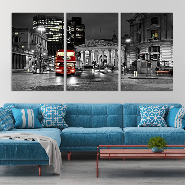 The London Night Red Bus Wall Art Canvas Print features a black and white cityscape with a moving red double-decker bus, crafted on museum-quality canvas with a UV-protective coating. This ready-to-hang artwork is designed to stand out and enhance any space.