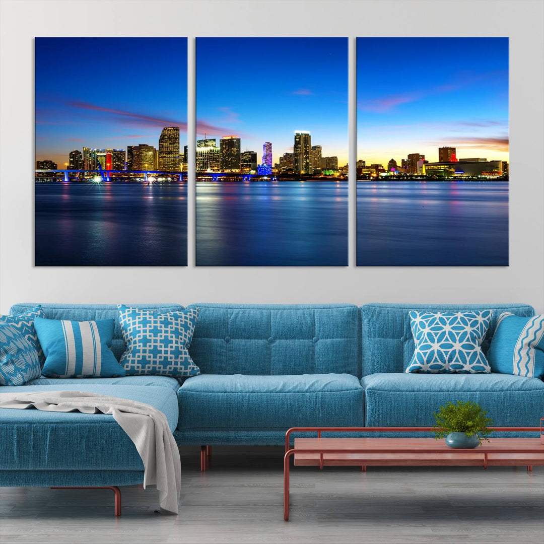 The living room features a Miami City Wall Art Canvas Print—a gallery-wrapped triptych displaying a city skyline at dusk, adding museum-quality elegance to the space.