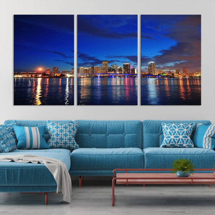 A large Miami City View Wall Art Canvas Print featuring the Miami City Skyline Panorama at night is displayed above the dresser.