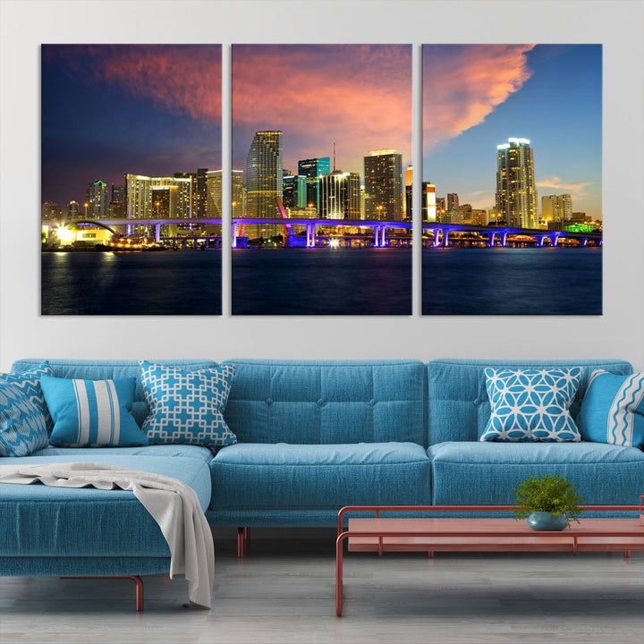 The modern living room is enhanced by the "Miami City Wall Art Canvas Print," a stunning triptych portraying a city skyline at sunset. These canvases are gallery wrapped and made from museum-quality materials, featuring a UV-protective coating to ensure lasting vibrancy.