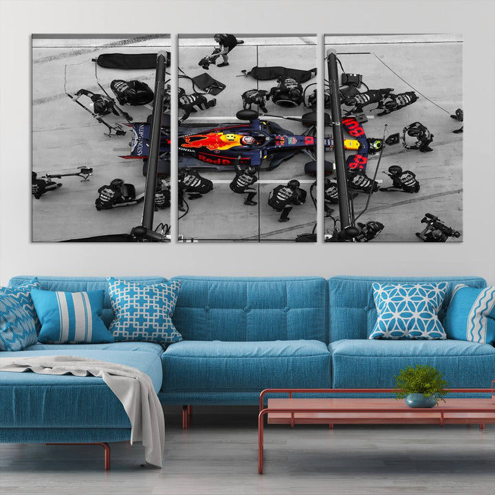 The RedBull Formula 1 Canvas Wall Art Print, a set of three gallery-quality pieces, elegantly adorns the wall.