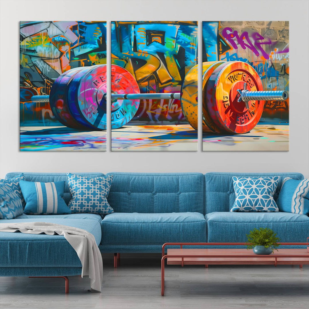 The Fitness Gym Barbell Graffiti Wall Art Canvas Print, a vibrant triptych featuring a barbell against a graffiti backdrop, elegantly hangs in the room. Crafted on premium canvas with a gallery-quality finish, this stunning piece of wall art effortlessly combines urban flair with sophisticated decor.