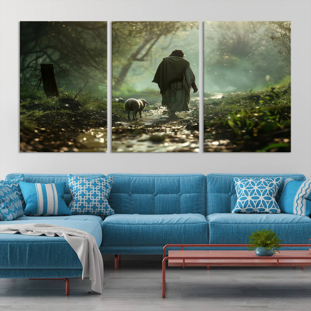 The wall art piece, titled "Jesus Shepherd a Lost Lamb Canvas Wall Art Print," is suspended on the wall and depicts a robed figure and a lamb wandering along a forest path.