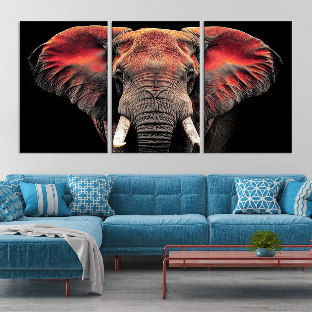 The Elephant Wall Art Canvas Print, featuring vibrant red and black tones, is a stunning artwork printed on museum-quality canvas. It comes with a UV-protective coating.