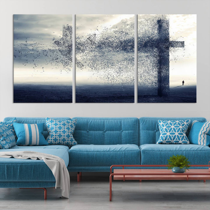 The "Jesus and the Fading Cross – Symbol of Faith" framed canvas print beautifully depicts a cross formed by birds against a moody sky above an ocean. This piece of Christian wall art infuses spirituality into the minimalist space.