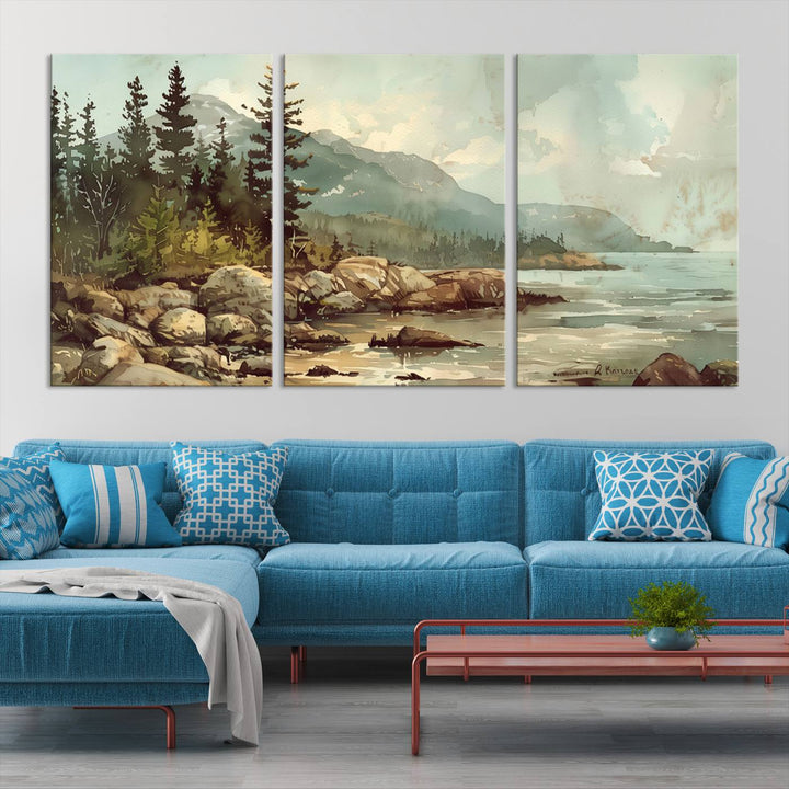 The living room features a breathtaking three-panel Abstract Acadia National Park Wall Art Canvas Print, which beautifully captures the rocky Maine coastline with trees and mountains.