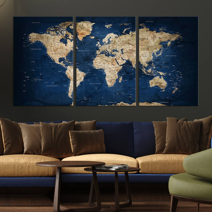 A triptych canvas print titled "Vintage Blue World Map Canvas Print - Classic World Map Design on Deep Blue Wall Art Print" adorns the wall, enhancing the decor with its antique style.