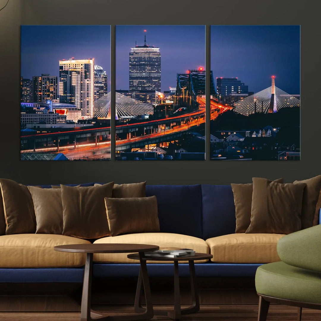 The "Boston City Lights Night Skyline Cityscape View" artwork on the wall showcases a brightly lit bridge at night. It is displayed on museum-quality canvas with a UV-protective coating.