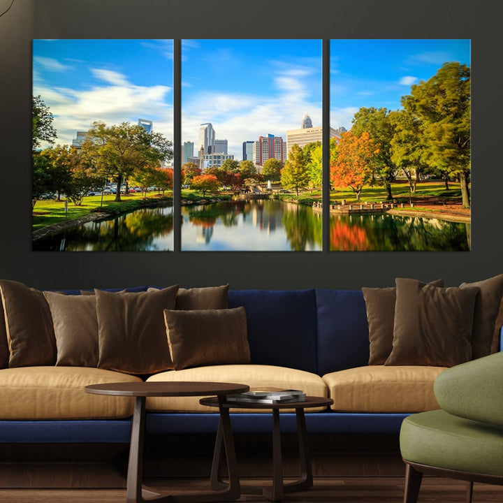 The Charlotte City Park at Spring Skyline Cityscape View wall art canvas print is a triptych featuring a scenic park with a lake and city skyline. It is gallery-wrapped on museum-quality canvases.