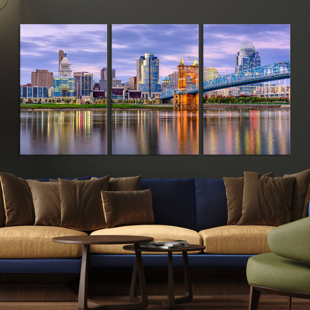 The wall art titled "Cincinnati City Lights Sunset Purple Cloudy Skyline Cityscape View" is beautifully printed on museum-quality canvases with a UV-protective coating and is ready to hang.