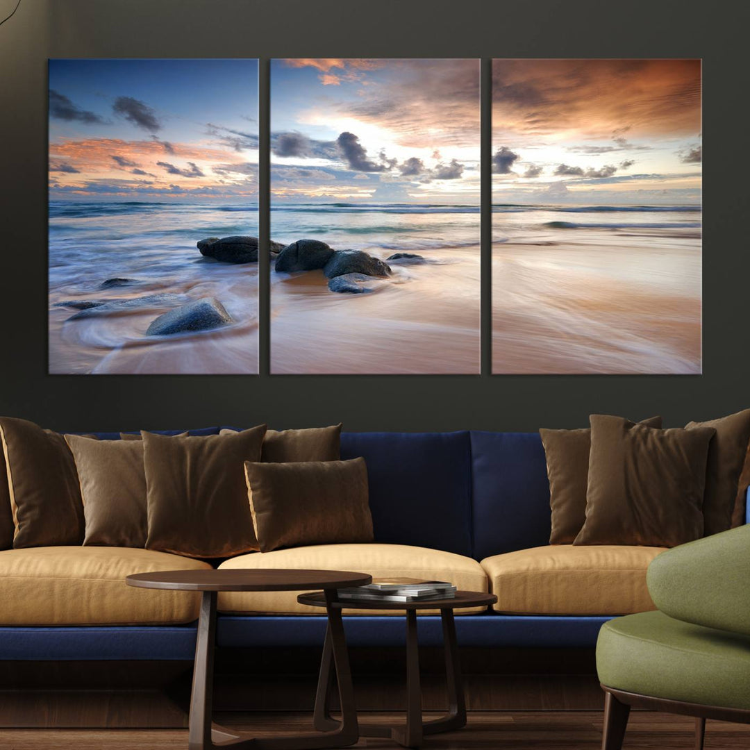 The "Serene Weather On The Beach Wall Art Canvas Print," featuring a tranquil beach scene with rocks and waves, is ready to hang and enjoy.