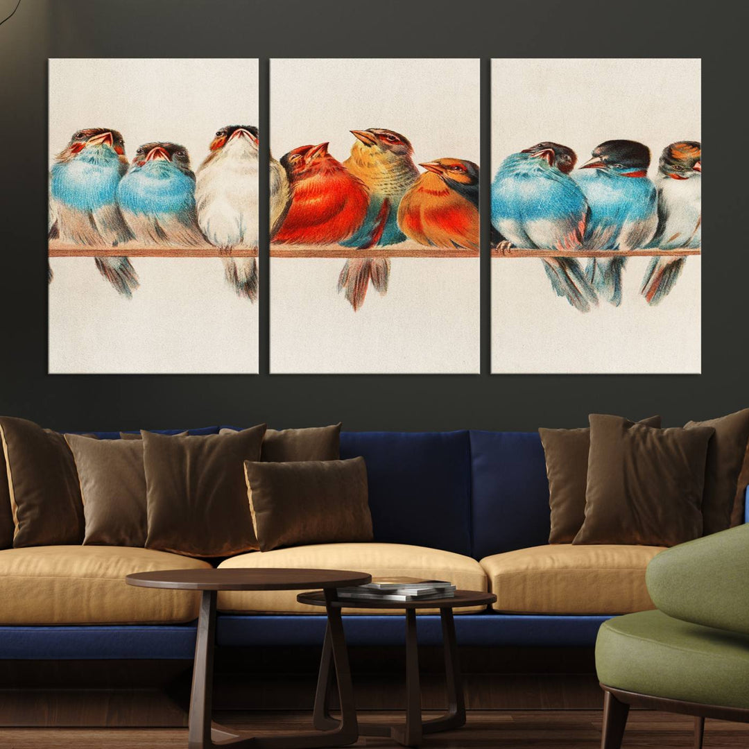 The Abstract Birds Wall Art Canvas Print, featuring a triptych of colorful birds perched on a branch, is printed on museum-quality canvas and equipped with a UV-protective coating and ready-to-hang design. This artwork adds vibrant elegance to your living space.