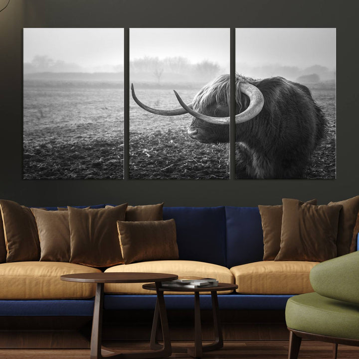 The living room features a three-panel wall art of a highland cow in a foggy field, using the Cow Wall Art Canvas Print for visual impact. This museum-quality canvas includes UV-protective coating to ensure longevity.