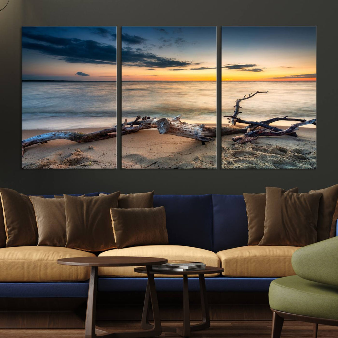 A captivating piece of Ocean Sunset Beach Wall Art Canvas Print, gallery wrapped, graces the gray wall.