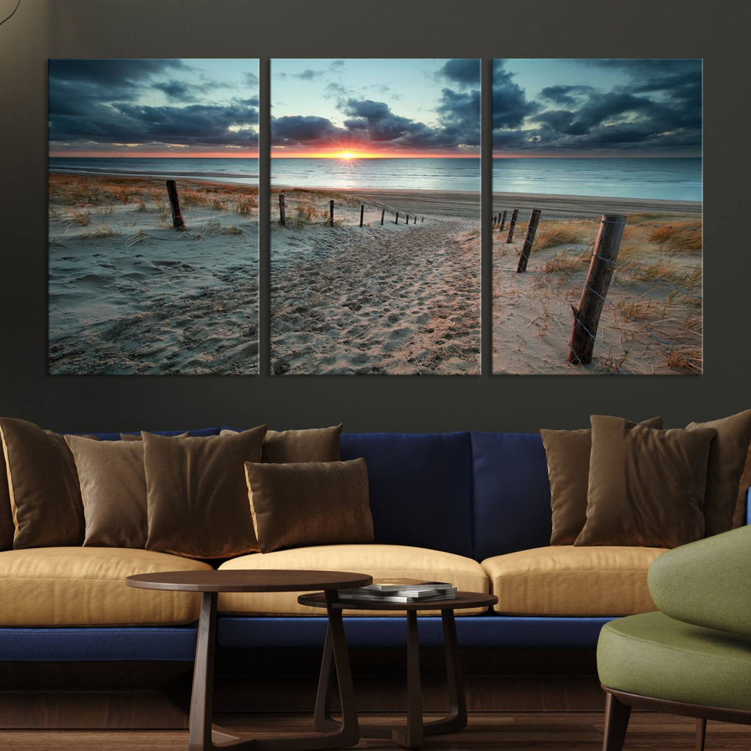 The modern living room features the Cloudy Weather Sunset Beach Wall Art Canvas Print. This museum-quality canvas adds a touch of sophistication with its hand-assembled framed art, ensuring lasting elegance. Enjoy free shipping on this exquisite piece.