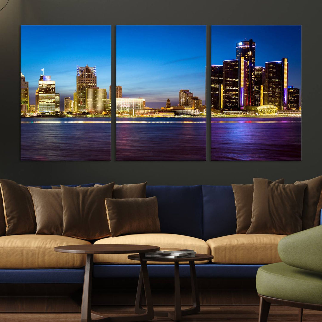 The living room features a breathtaking canvas print titled "Detroit City Lights Night Bright Blue Skyline Cityscape View," presented in a stunning triptych format on museum-quality canvases that are ready to hang.