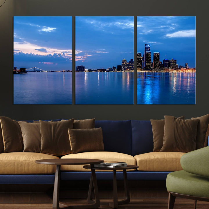 The "Detroit City Lights Night Blue Cloudy Skyline Cityscape View" wall art, displayed on museum-quality canvases, is split into three gallery-wrapped panels.