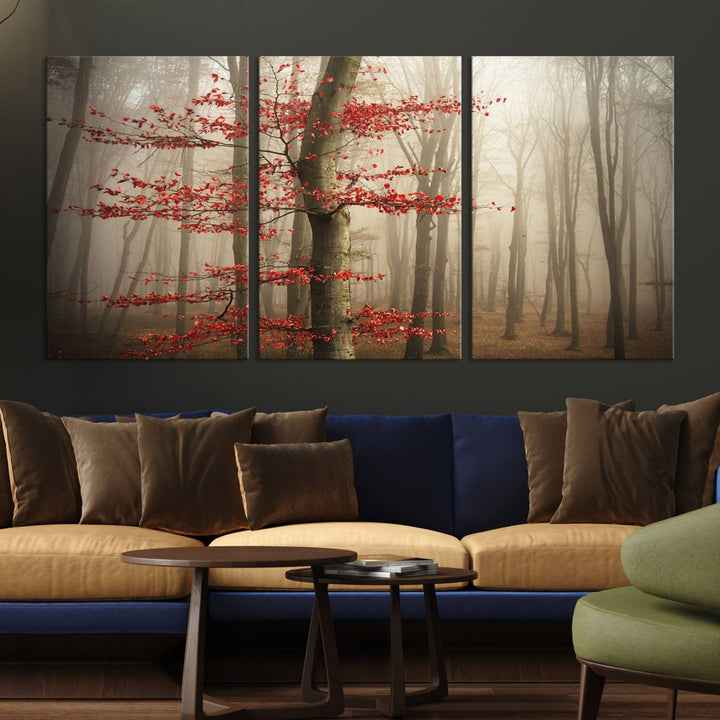 The living room features the Foggy Forest Wall Art, an Autumn Trees Canvas Print that showcases a serene nature scene with foggy woodland decor and a tree adorned in vibrant red leaves.