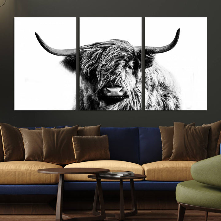 The Scottish Highland Cow Cattle Art Print Farmhouse Wall Art Canvas Print enhances rustic farmhouse decor with its depiction of a long-haired, large-horned cow. This triptych is an ideal choice for chic wall art.