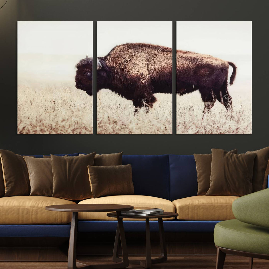 A stylish living room showcases the captivating "Bison in Field" Wall Art Canvas Print as farmhouse decor.