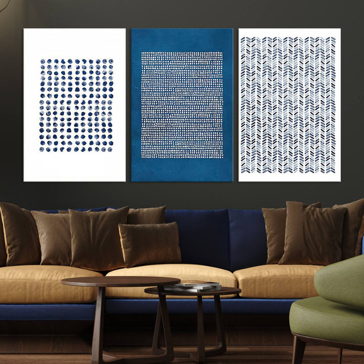 The modern living room is beautifully complemented by the "Canvas Print Wall Art Set Navy Blue White Geometric Dot Collage Abstract Illustr Art" on the wall. This art is printed on museum-quality canvas with a UV-protective coating for enhanced durability and vibrancy. Each piece is ready to hang, offering an effortless upgrade to your space.