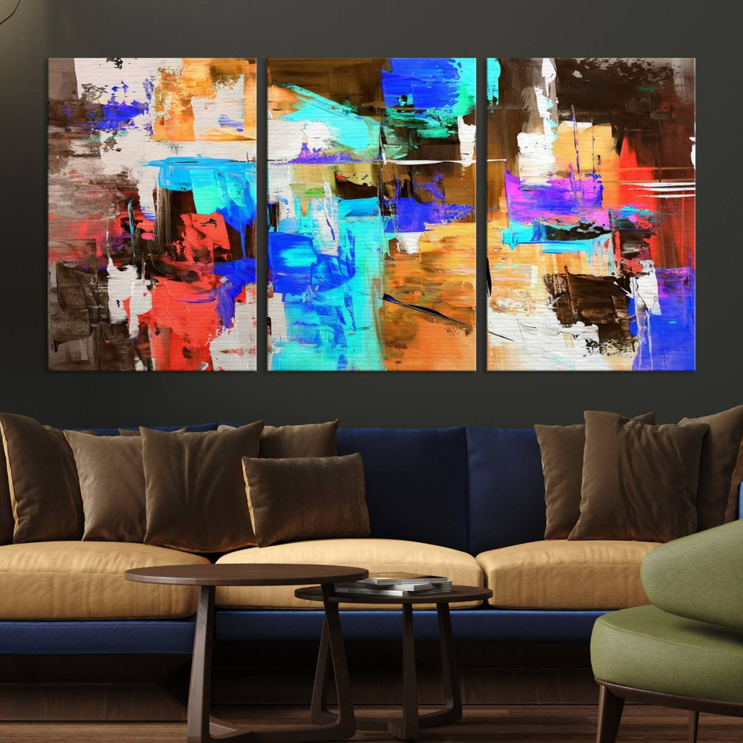 In a modern living room, the "Colorful Abstract Wall Art Canvas Print" serves as a stunning triptych centerpiece on museum-quality canvas, ready to hang. Its UV-protective coating ensures enduring vibrancy.