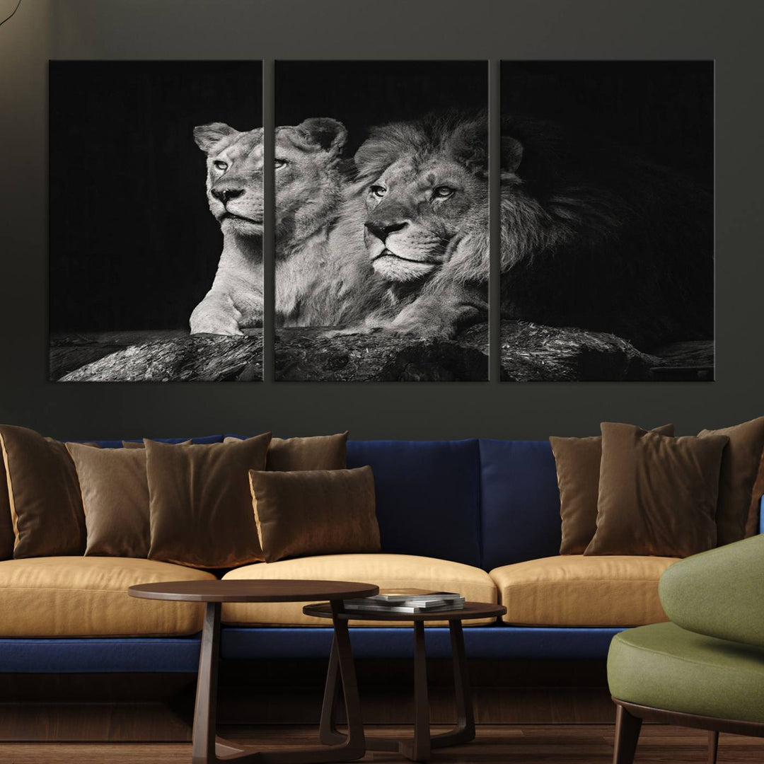 The elegant wildlife portrait, "Lion Couple Canvas Wall Art Print," featuring a black and white depiction of a lion family, majestically decorates the living room wall.