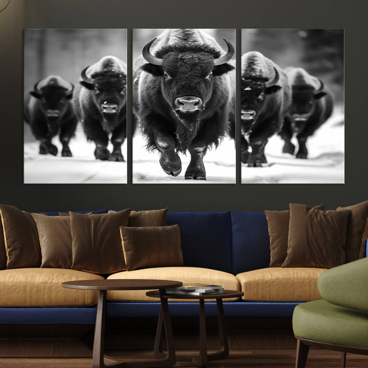 A modern living room features a striking black-and-white American Bison Art | Buffalo Herd Wall Art Canvas Print on the wall.