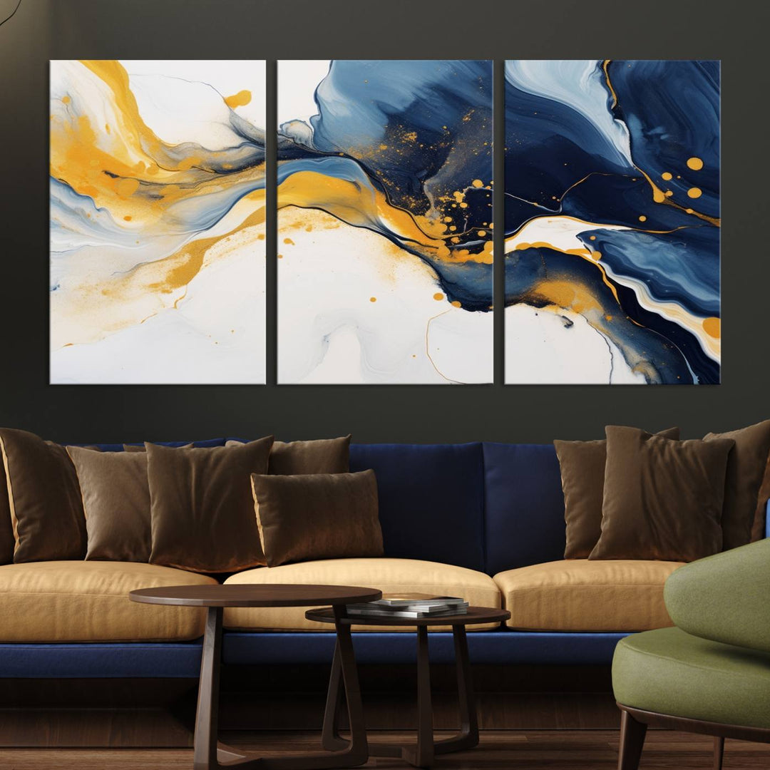 The Blue and Gold Abstract Fluid Canvas Art, with its swirling patterns, adorns the wall. This modern wall art beautifully complements the contemporary interior decor, adding an elegant touch with its rich blue, gold, and white tones.