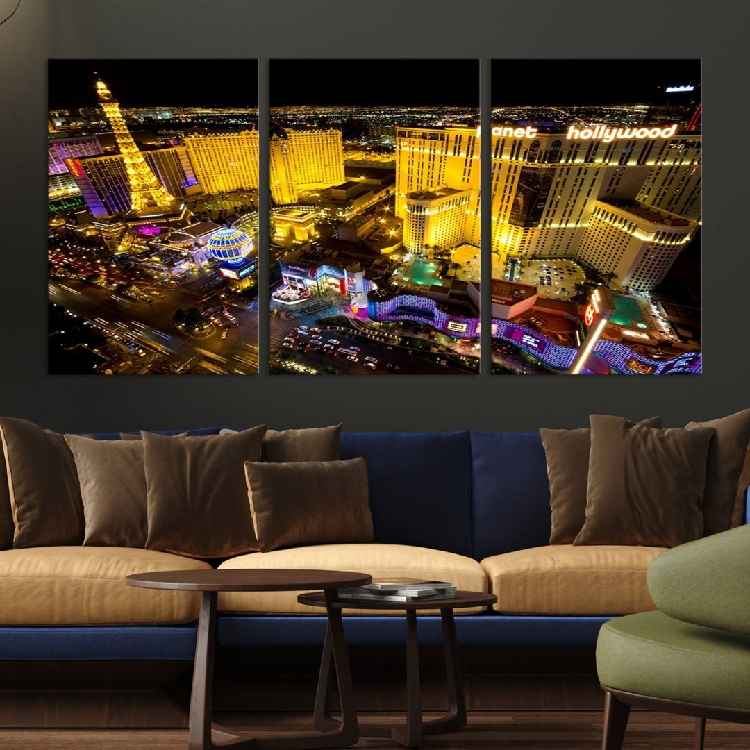 The modern living room features a Las Vegas Wall Art Canvas Print, a museum-quality triptych showcasing a vibrant cityscape with neon lights.