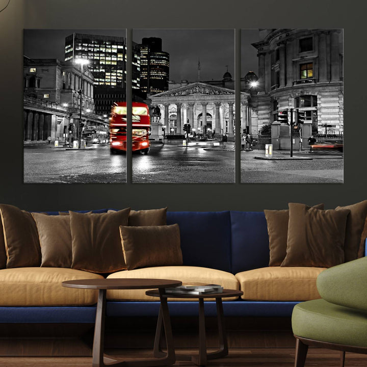 The London Night Red Bus Wall Art Canvas Print features a black and white cityscape with a moving red double-decker bus, crafted on museum-quality canvas with a UV-protective coating. This ready-to-hang artwork is designed to stand out and enhance any space.