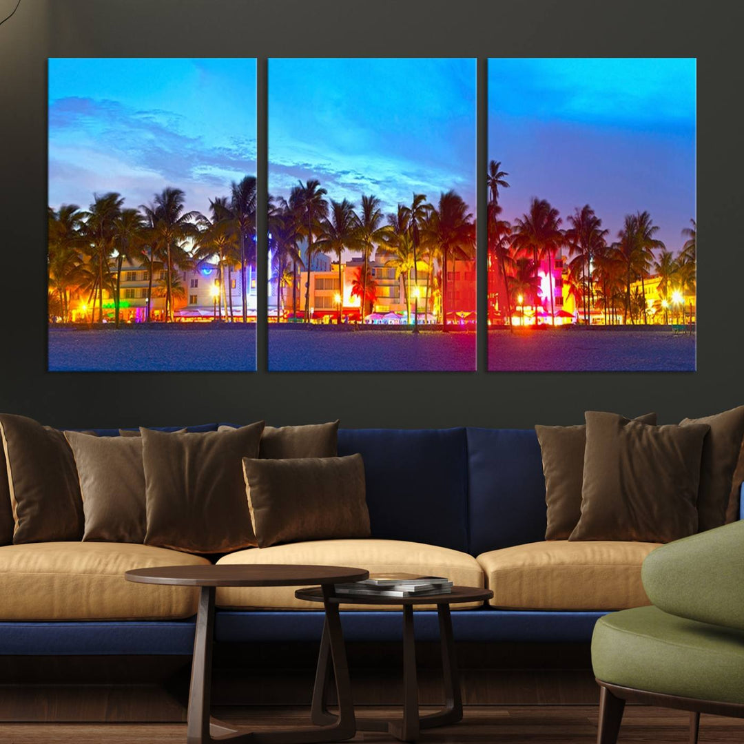 The living room features a three-panel Miami City Wall Art Canvas Print, showcasing a colorful, illuminated beach scene with palm trees on museum-quality canvas.