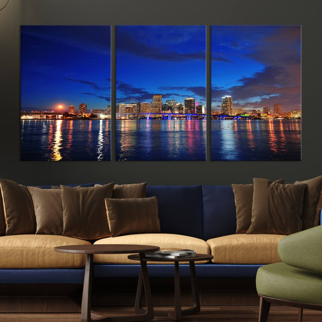 A large Miami City View Wall Art Canvas Print featuring the Miami City Skyline Panorama at night is displayed above the dresser.