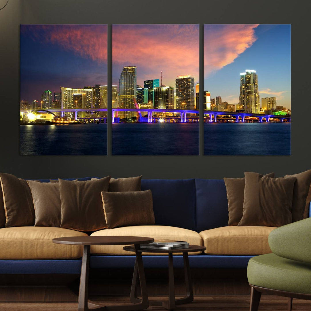 The modern living room is enhanced by the "Miami City Wall Art Canvas Print," a stunning triptych portraying a city skyline at sunset. These canvases are gallery wrapped and made from museum-quality materials, featuring a UV-protective coating to ensure lasting vibrancy.