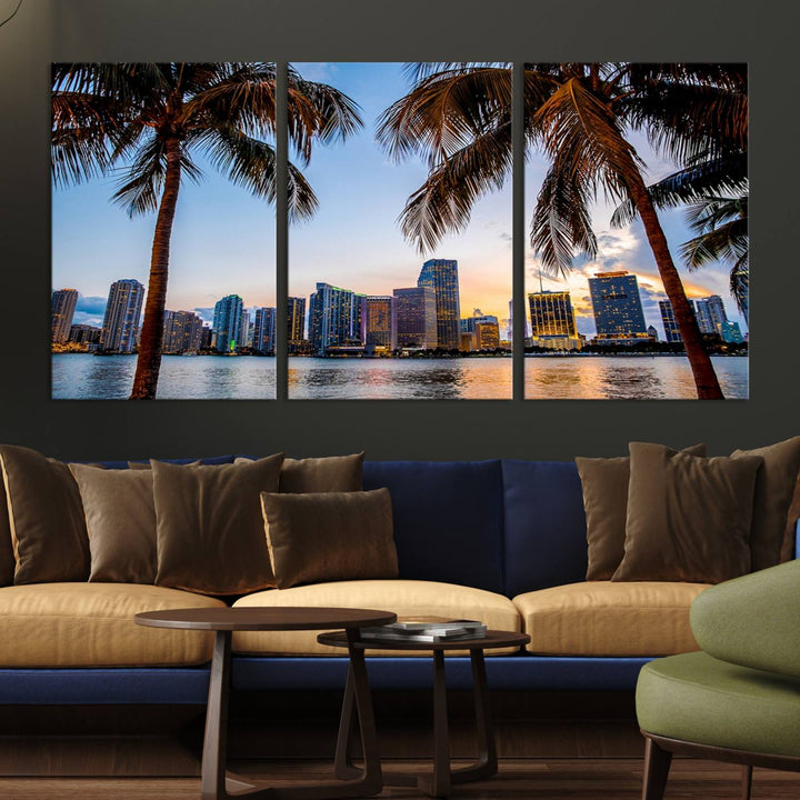 The Wall Art MIAMI Canvas Print features a triptych design depicting palm trees and a city skyline at sunset.