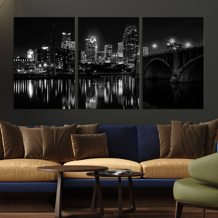 The "Minneapolis Wall Art Canvas Print, Minnesota City Wall Art Print, Minnesota Cityscapes Wall Art" features a black and white triptych of a city skyline with a bridge. Crafted on museum-quality canvas, this gallery-wrapped artwork is finished with a UV-protective coating to ensure lasting beauty.