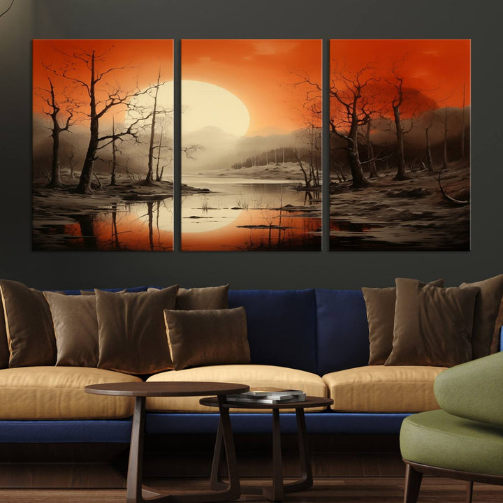 The "Abstract Watercolor Trees and Sunset on Lake Wall Art" is a triptych masterpiece, showcasing an orange-hued landscape of barren trees and a large sun. Displayed on museum-quality canvases with UV-protective coating, it creates a striking visual element in any space.