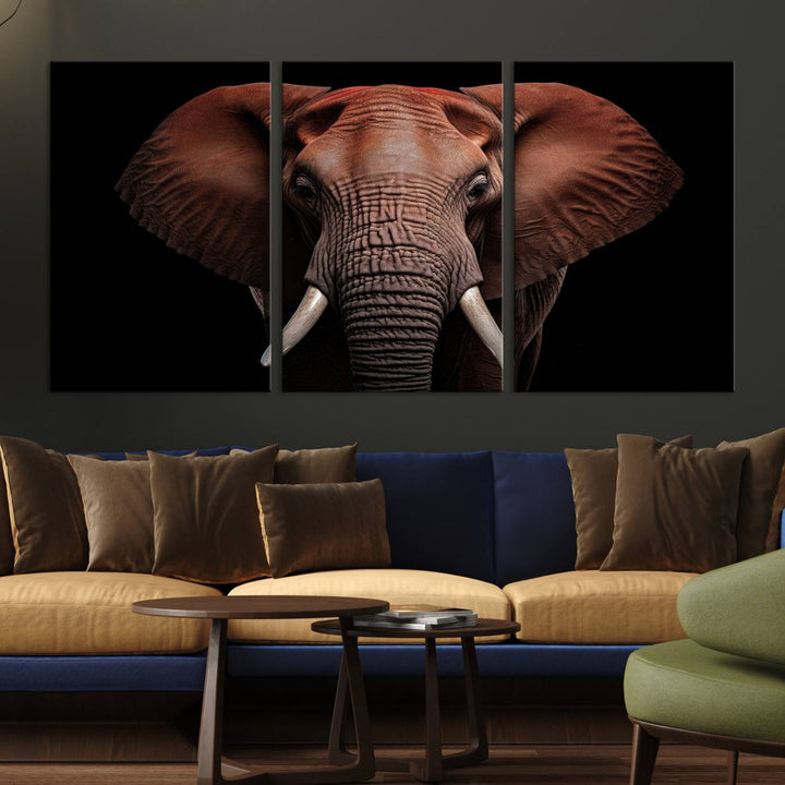 A stunning triptych titled "Wild Elephant Wall Art Canvas Print" beautifully enhances the wall above a contemporary living room. This Africa Savannah Wild Animal Wall Decor Print is of museum-quality, complete with a UV-protective coating to ensure its vibrancy and beauty are preserved for years.