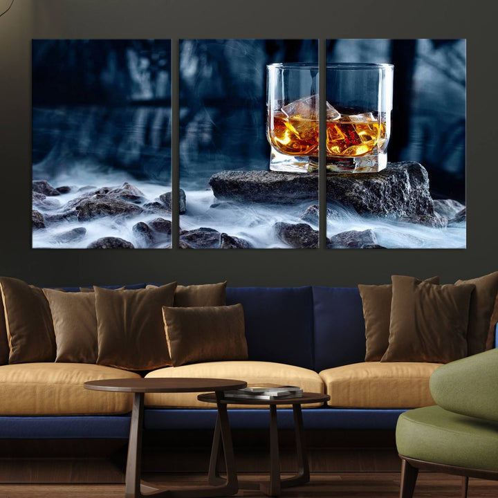 The Whiskey Ice Wall Art Canvas Print, a triptych featuring a glass of whiskey on the rocks, is crafted with a gallery-quality finish on premium canvas.