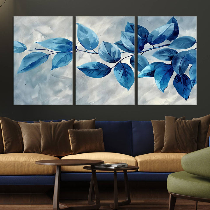 A Blue Leaf Abstract Wall Art Canvas Print, featuring a textured background and gallery-quality finish, is displayed.